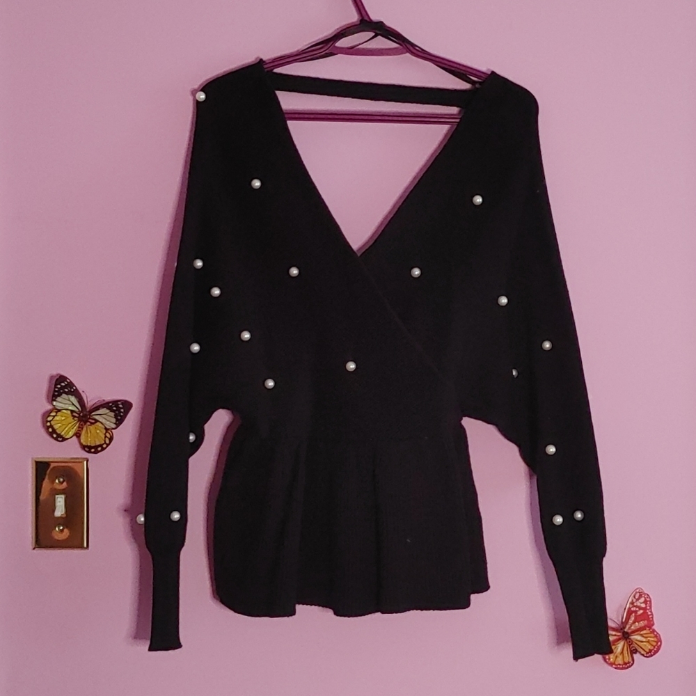 Black double v-neck peplum sweater